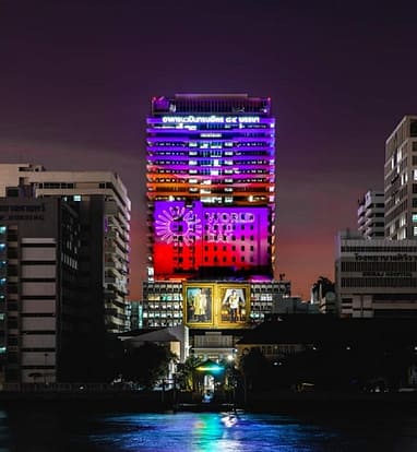 View of the Navamindrapobitr 84th Anniversary Building at Siriraj Hospital illuminated at the riverside for the World Neglected Tropical Diseases Day light-up campaign 