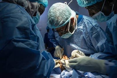 Doctors doing an operation on the foot