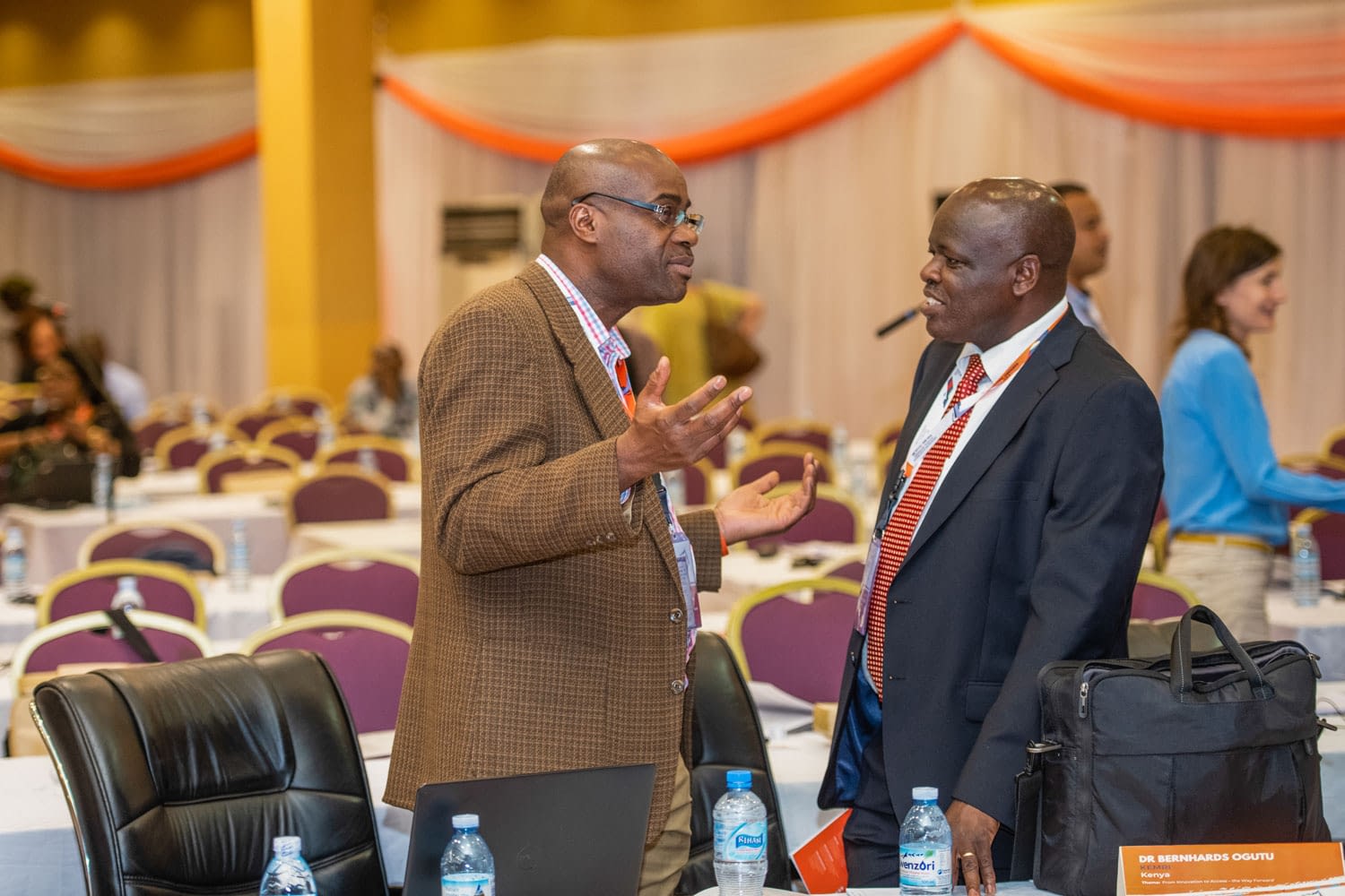 From left, Prof. Kelly Chibale of University of Cape Town, South Africa and Dr Bernhards Ogutu of KEMRI Kenya sharing an interactive moment.