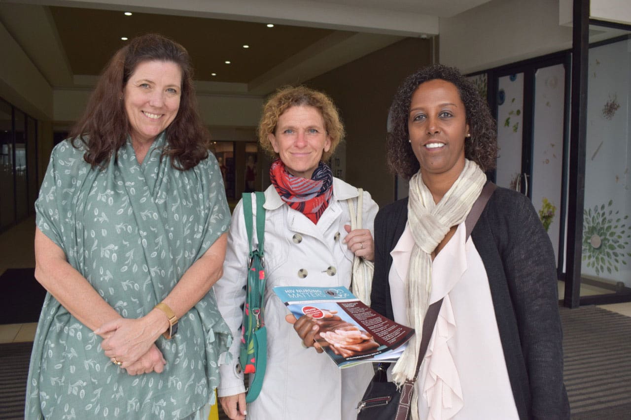 DNDi-GARDP Southern Africa director, Carol Ruffell (left), presents the December 2022 edition of HIV Nursing Matters and the 2022 paediatric ARV dosing chart to Bénédicte Schutz, Monaco’s Director of International Cooperation (centre), and Yordanos Pasquier, Monaco’s Deputy Director of International Cooperation (right).