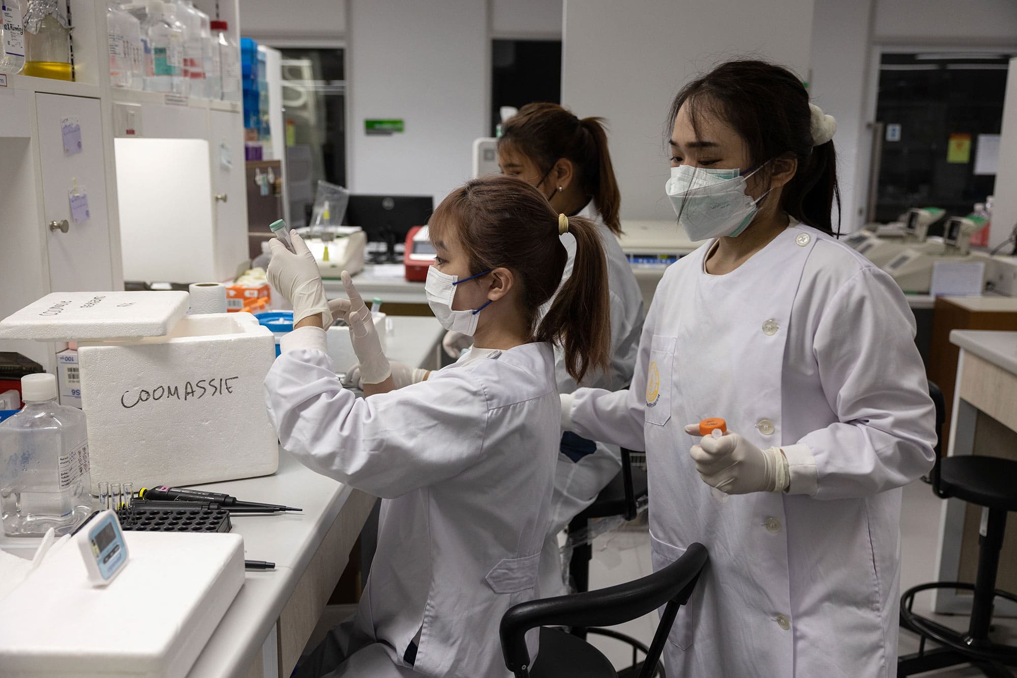Researchers in lab setting